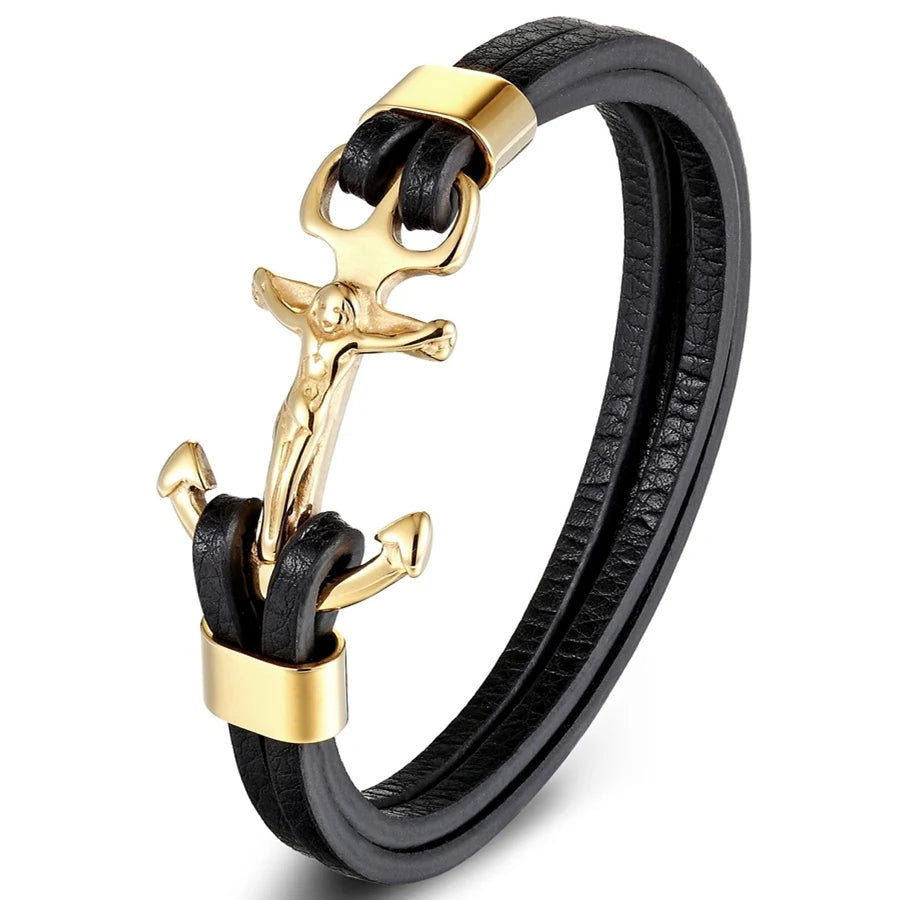 Un élégant bracelet en cuir noir est orné d'une ancre en métal argenté, stylisée avec une silhouette humaine cruciforme