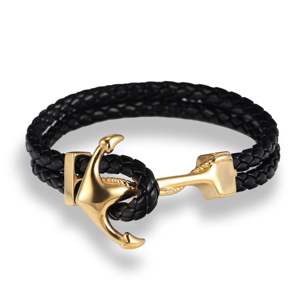 Ce bracelet, tressé de cuir et orné d'une ancre dorée, incarne l'esprit aventureux et intemporel du marin en quête de trésors
