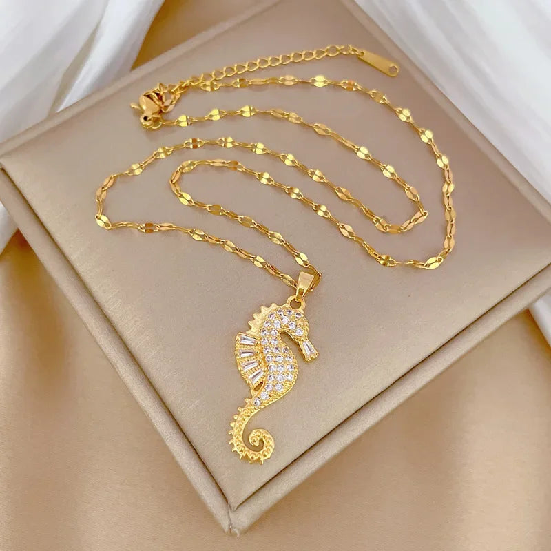 HIPAKALA gold seahorse pendant