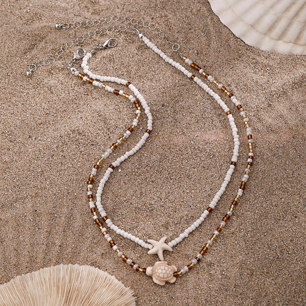 Two TORTUESTAR shell necklaces