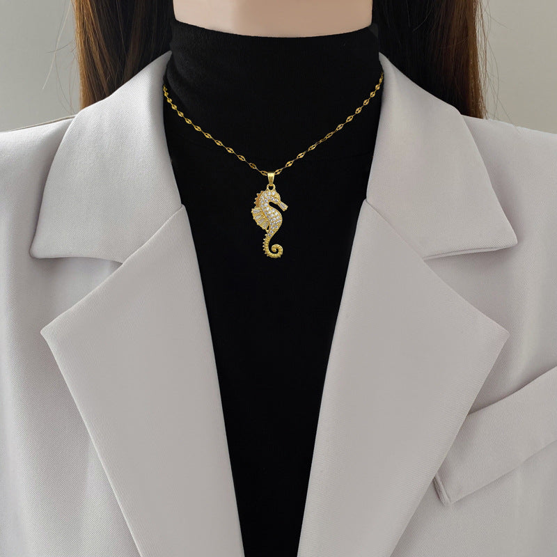 HIPAKALA gold seahorse pendant