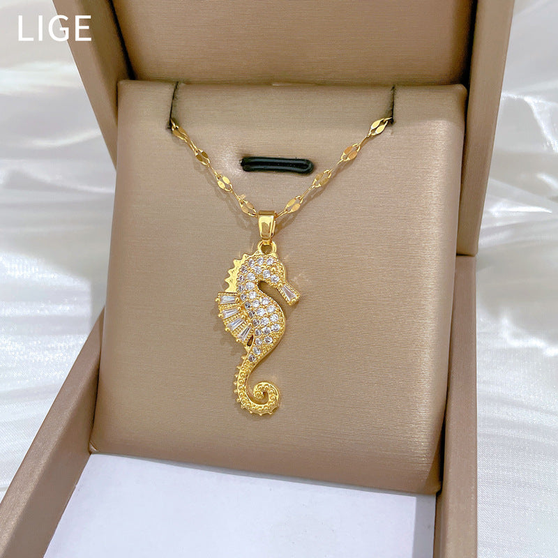 HIPAKALA gold seahorse pendant