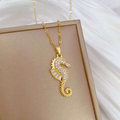 HIPAKALA gold seahorse pendant